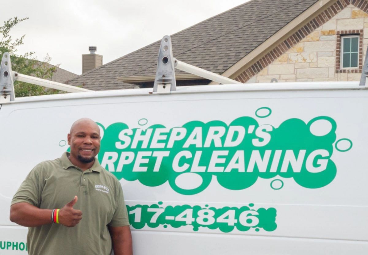 Lando Shepard owner of Shepard's Carpet Care with professional carpet cleaning van in Austin TX
